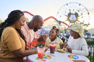 Image of a family having lunch inside Disney California Adventure Park